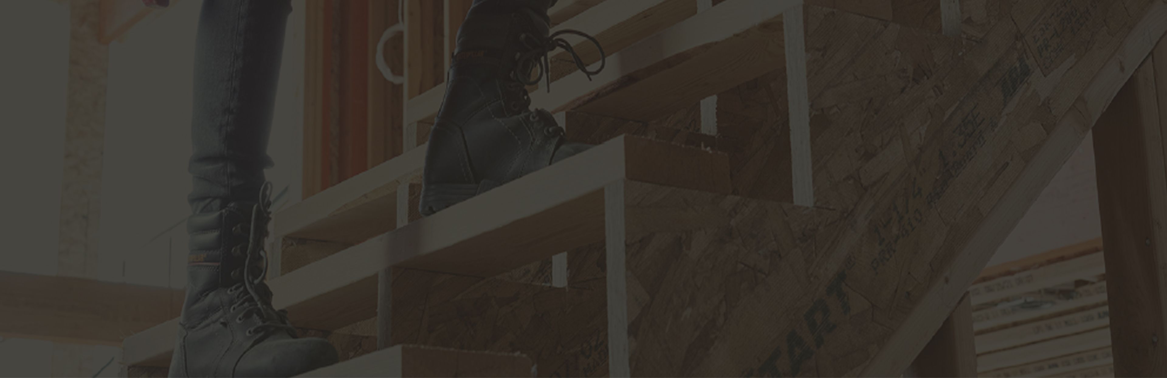 Climbing stairs on a construction site.